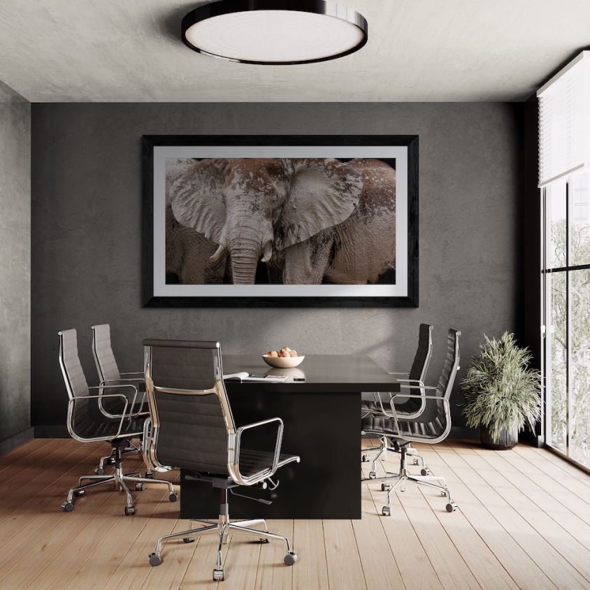 Meeting room with framed print on wall